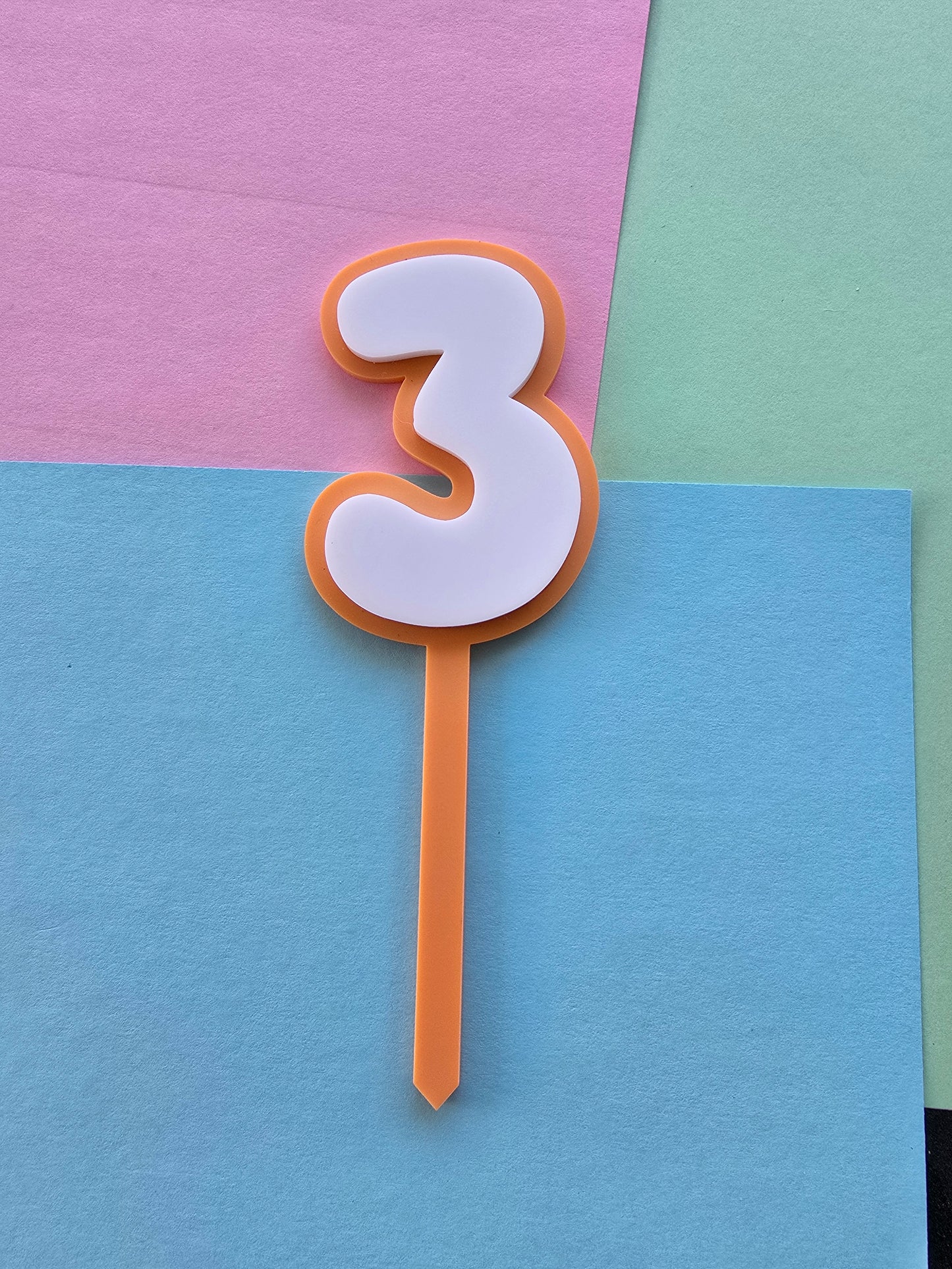 3 Cake Topper white on orange 7.5cm x 5cm