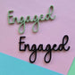 Engaged cake charm 10cm wide black and olive (2 pack)
