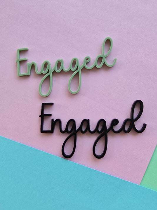 Engaged cake charm 10cm wide black and olive (2 pack)