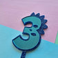 3 Dinosaur Cake Topper 10cm tall (7cm wide) blue mirror on blue glitter