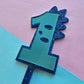 1 Dinosaur Cake Topper 10cm tall (6cm wide) blue mirror on blue glitter