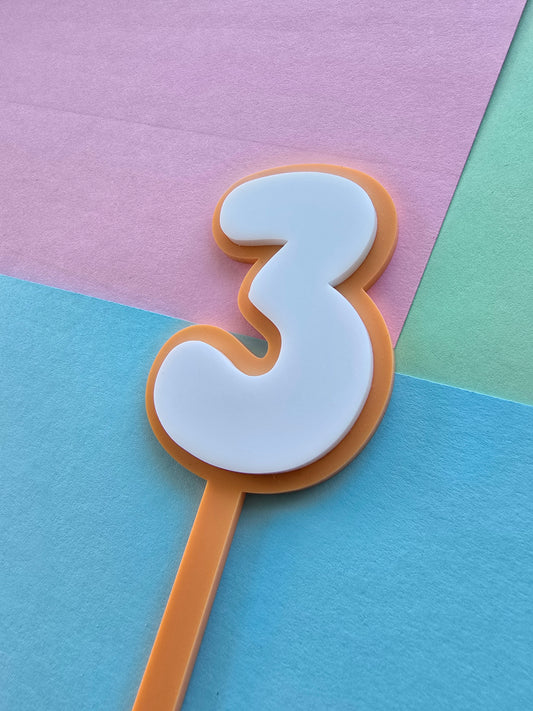 3 Cake Topper white on orange 7.5cm x 5cm