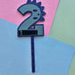 2 Dinosaur Cake Topper 10cm tall (7cm wide) blue mirror on blue glitter