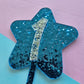 Glitter star cake topper 1 - silver on blue hex glitter 10cm wide